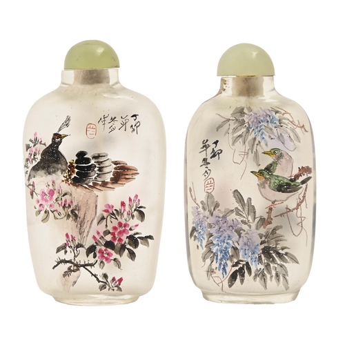 606 - Two reverse painted Chinese interior painted glass snuff bottles, both decorated with flowers and bi... 