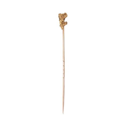 61 - A gold stickpin with gold nugget terminal, c1900, terminal approx 7 x 12mm, 2.6g