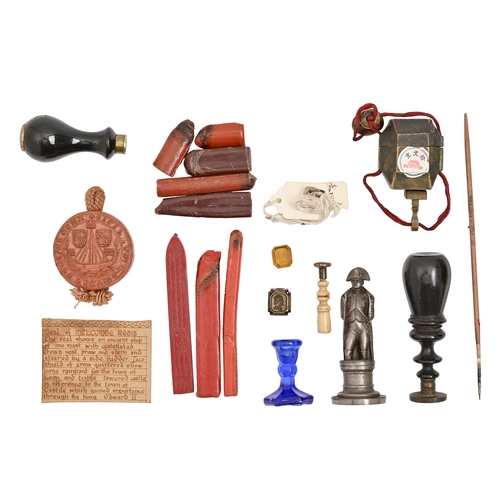 628 - A Victorian wax sealing kit, including bone and ebony handled seals, a later pewter Napoleon figural... 