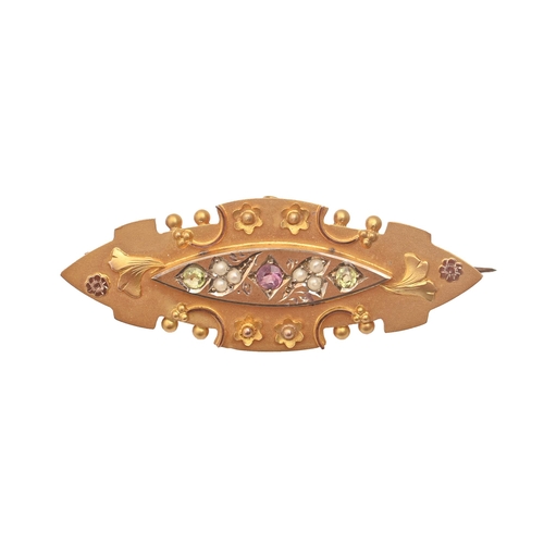 63 - A Victorian shuttle shaped gold brooch, variously gem set, 48mm l, marked 9ct, 3.6g