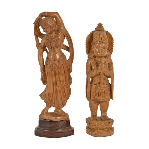 636 - An Indian carved wood statue of Sri Hanuman, 22cm h and another carved statuette of a female dancer,... 