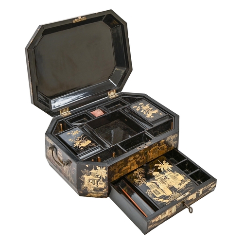 651 - A Chinese lacquer octagonal sewing box, early 20th c, with fitted interior and twin brass handles, 3... 