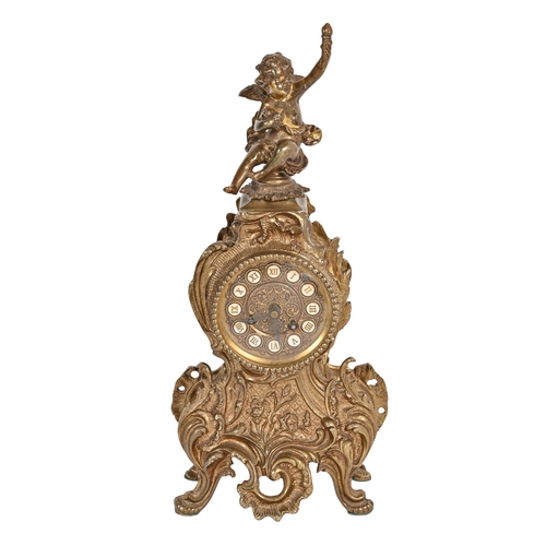 669 - A Louis XV style brass mantle clock, mounted with a cherub, the dial with enamel chapters, 42cm h, k... 