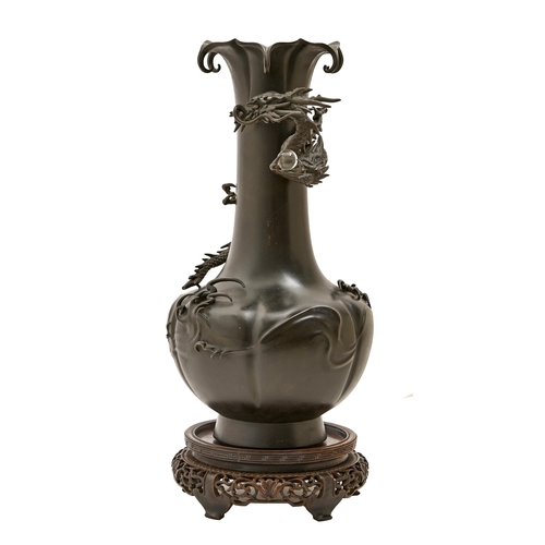 673 - A Japanese bronze baluster vase, early 20th c, mounted with a dragon,   44cm h, on contemporary turn... 