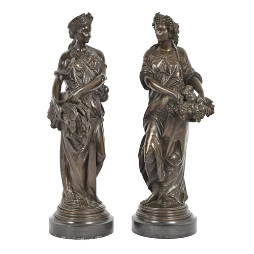 694 - A pair of French bronze statuettes of women, emblematic of Summer and Autumn, late 19th c, cast from... 