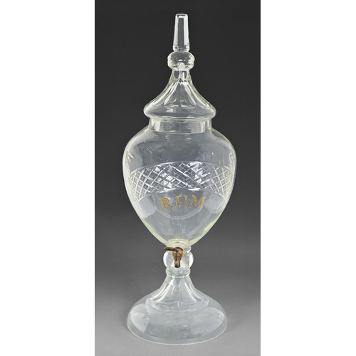 703 - A Victorian publican's shield shaped cut glass spirit fountain and cover, inscribed RUM, 78cm h... 