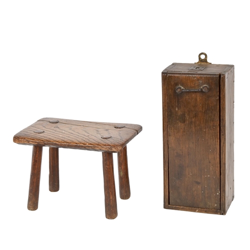 714 - An early 19th c oak wall hanging candle box, with sliding door, 32cm h, and a contemporary ash stool... 