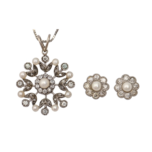 71A - A diamond and cultured pearl snowflake pendant in white gold, 24mm diam, a pair of similar ear studs... 