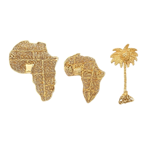 72 - Three Nigerian gold brooches, 46mm and smaller, each with gold pin, one marked 18, 26g... 