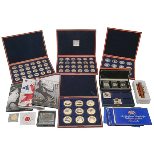 724 - Miscellaneous commemorative and collectors' coins, including QEII, WWII, Elvis Presley and the Titan... 