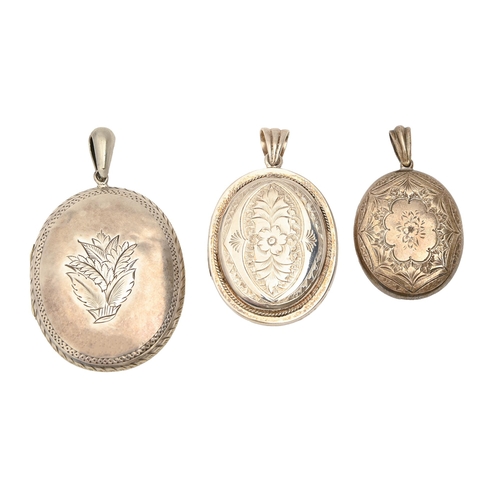 78 - A Victorian silver engraved oval locket, a larger silver locket and a plated example, various sizes ... 