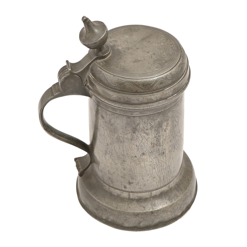 780 - A German pewter tankard, early 19th c, with vase finial, the lid engraved and Lehmann... 1835, the b... 