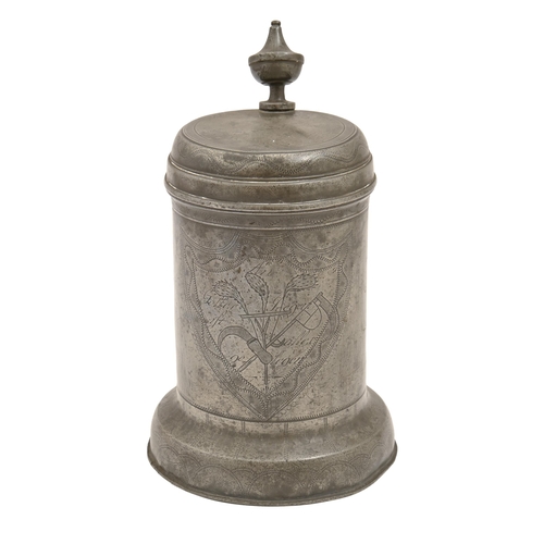 780 - A German pewter tankard, early 19th c, with vase finial, the lid engraved and Lehmann... 1835, the b... 