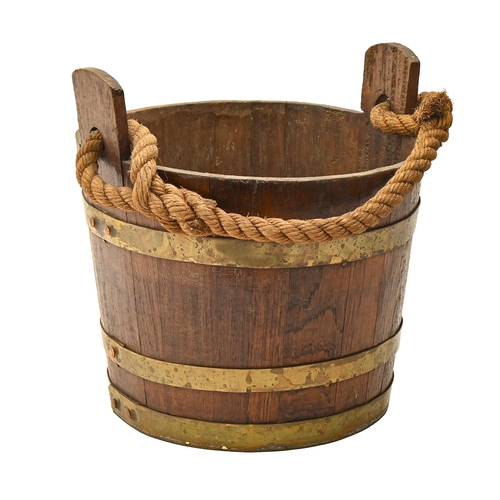 789 - A brass bound oak bucket, early 20th c,  rope handle, 31cm diam