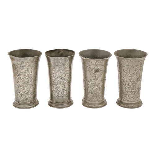 836 - Four Continental pewter beakers, 19th c, engraved with panels of tulips and other flowers betwe... 