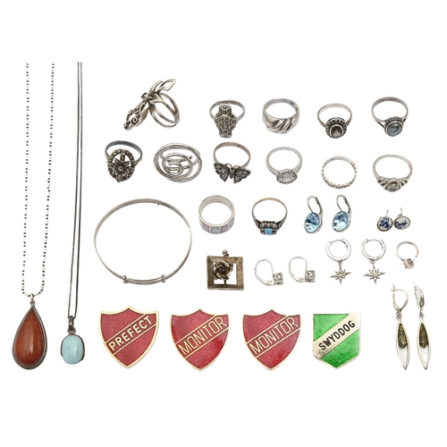 84 - Miscellaneous silver jewellery, several items gem set, 2ozs 10dwts and four base metal enamel badges... 