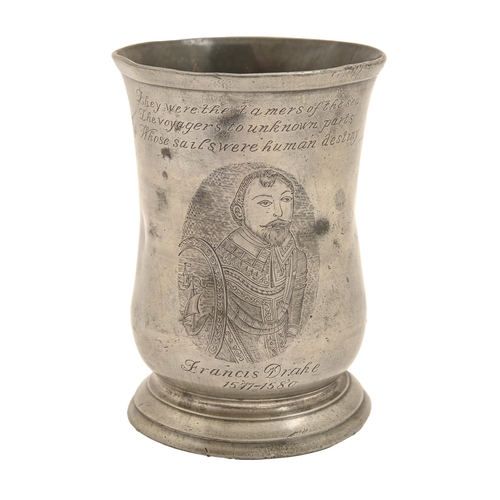 842 - An English pewter baluster mug, 19th c, engraved with an oval portrait of Sir Francis Drake and... 