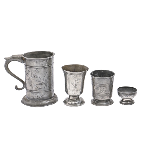 844 - A Northern European pewter cylindrical mug, early 19th c, engraved with the emblems of husbandr... 