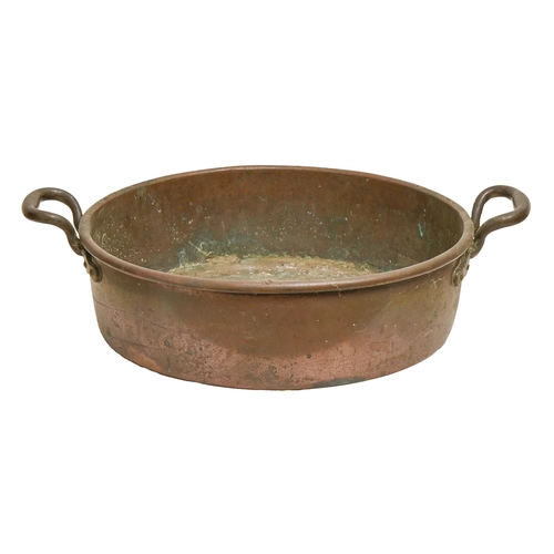 854 - An English copper preserving pan, mid 19th c, with rivetted loop handles, 42cm diam,... 