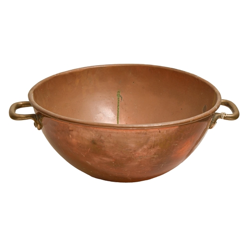 855 - An English copper pan,  almost hemispherical with rolled rim and rivetted brass handles, 49cm d... 