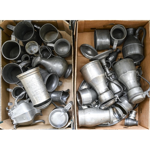 867 - A quantity of early 19th c and later pewter ware, including tankards, measures, jugs and plates... 