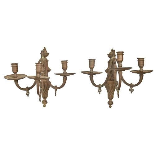 873 - A pair of brass wall sconces,  20th c,  of three lights, 37cm h and a Dutch style bra... 