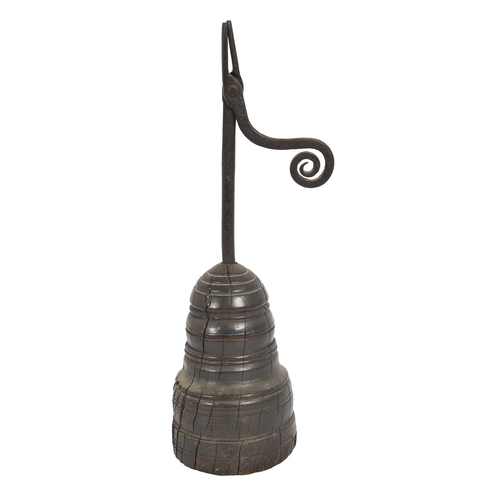 888 - A George III iron rush nip and  holder, terminating in a scroll, on turned wood foot, 31.5cm h... 