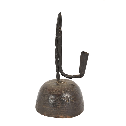 889 - A George III wrought iron rush nip and holder, the domed wood foot branded I C 24cm h... 