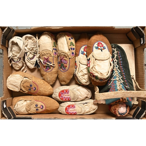 897 - Native North American folk art. Five pairs of leather and beadwork moccasins and a doll, c.mid 20th ... 