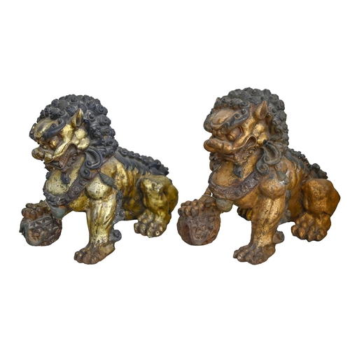 913 - A pair of painted cast iron dogs of Fo, early 20th c, 33cm h