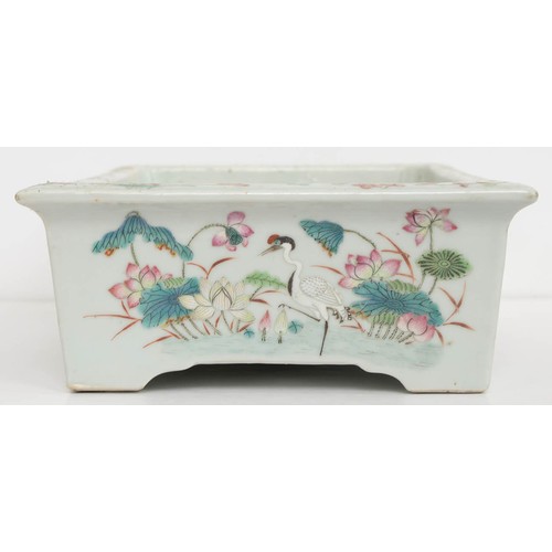 392 - A Chinese famille rose rectangular jardiniere, 19th c, painted with wading and other birds, lotus an... 