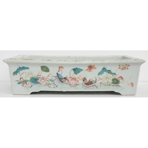 392 - A Chinese famille rose rectangular jardiniere, 19th c, painted with wading and other birds, lotus an... 