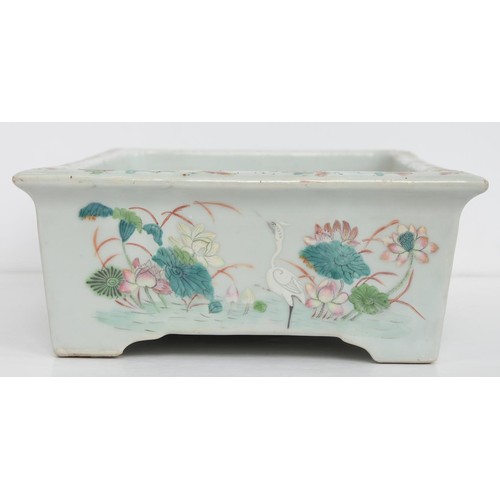 392 - A Chinese famille rose rectangular jardiniere, 19th c, painted with wading and other birds, lotus an... 