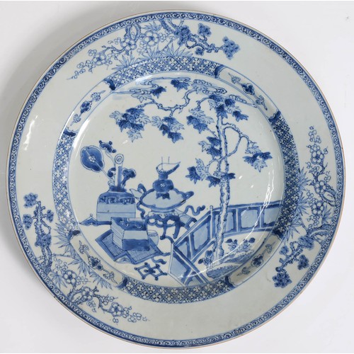 472 - A Chinese export blue and white charger, 18th c, painted with auspicious objects beneath a maple tre... 