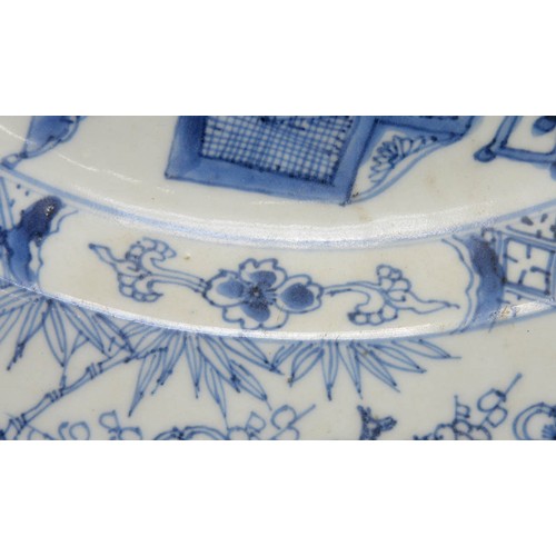 472 - A Chinese export blue and white charger, 18th c, painted with auspicious objects beneath a maple tre... 