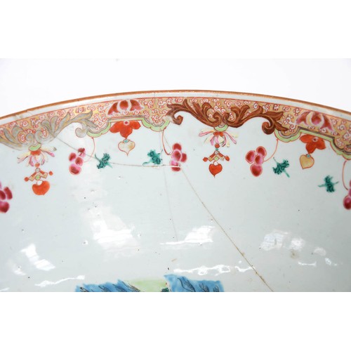 482 - A Chinese porcelain export famille rose punch bowl, 18th c, painted with scenes reserved on a gilt c... 