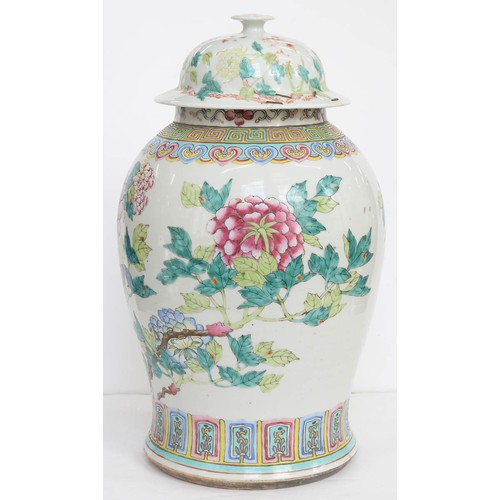 483 - A Chinese famille rose vase and associated cover, early 19th century, enamelled with peony branches,... 