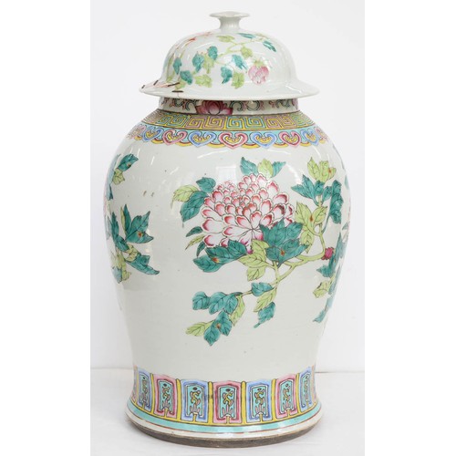 483 - A Chinese famille rose vase and associated cover, early 19th century, enamelled with peony branches,... 