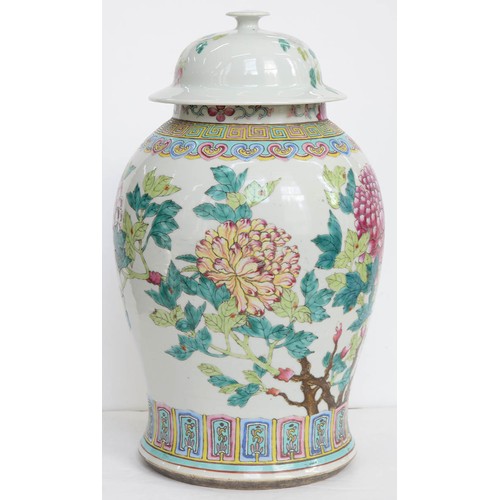 483 - A Chinese famille rose vase and associated cover, early 19th century, enamelled with peony branches,... 