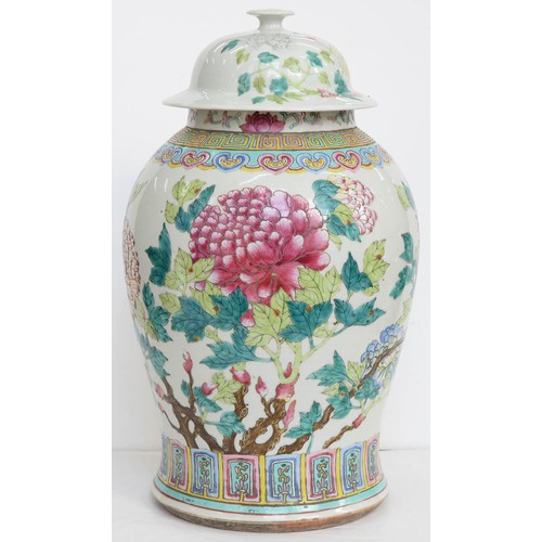 483 - A Chinese famille rose vase and associated cover, early 19th century, enamelled with peony branches,... 