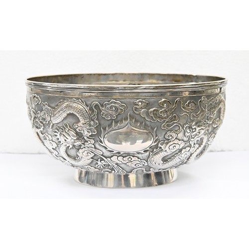 346 - A Chinese silver repousse dragons bowl c1900, 17cm diam, marked CS and in Chinese, 11oz 3dwt... 