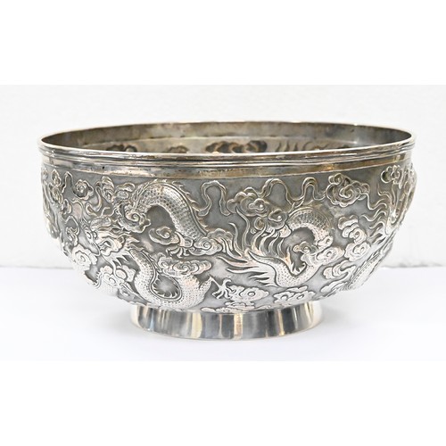 346 - A Chinese silver repousse dragons bowl c1900, 17cm diam, marked CS and in Chinese, 11oz 3dwt... 