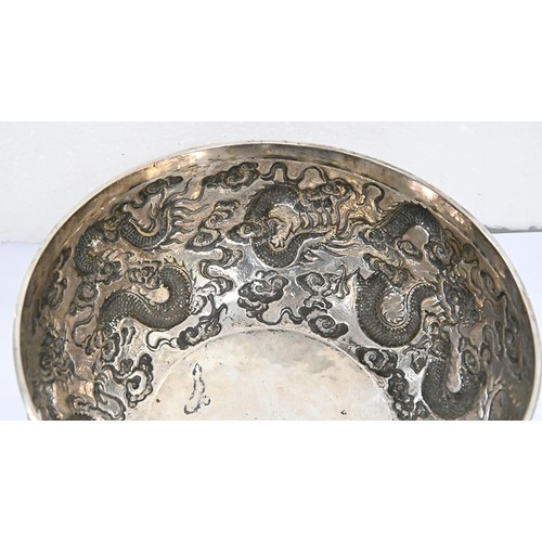 346 - A Chinese silver repousse dragons bowl c1900, 17cm diam, marked CS and in Chinese, 11oz 3dwt... 