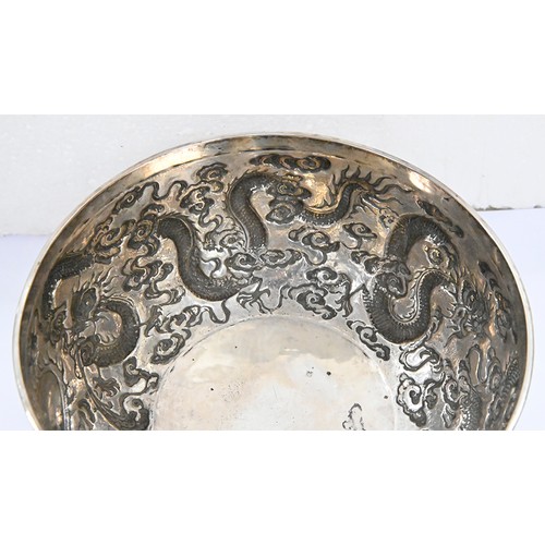 346 - A Chinese silver repousse dragons bowl c1900, 17cm diam, marked CS and in Chinese, 11oz 3dwt... 