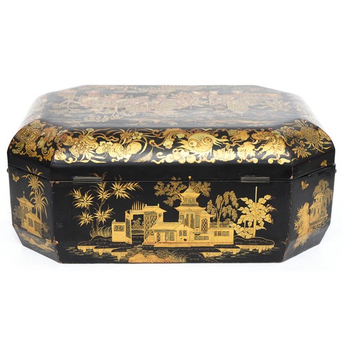 651 - A Chinese lacquer octagonal sewing box, early 20th c, with fitted interior and twin brass handles, 3... 