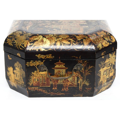 651 - A Chinese lacquer octagonal sewing box, early 20th c, with fitted interior and twin brass handles, 3... 