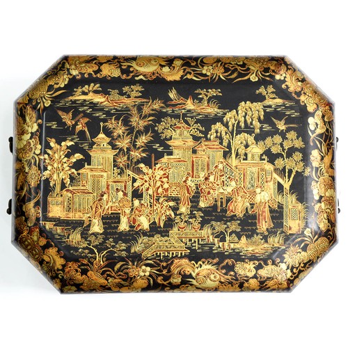 651 - A Chinese lacquer octagonal sewing box, early 20th c, with fitted interior and twin brass handles, 3... 