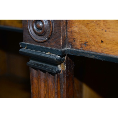 1176 - A Victorian breakfront oak bookcase, with ebonised mouldings, fitted with adjustable shelves, 121cm ... 