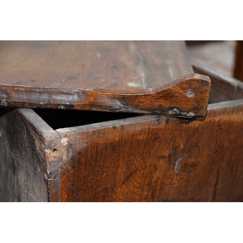 1194 - An oak coffr bach, late 18th/early 19th c, the front with break arched, raised and fielded panels ab... 