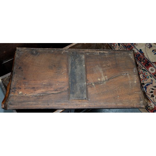 1194 - An oak coffr bach, late 18th/early 19th c, the front with break arched, raised and fielded panels ab... 